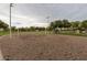 Community sand volleyball court with lights, inviting residents for friendly matches and outdoor fun on sunny days at 1114 S Presidio Ave, Gilbert, AZ 85233