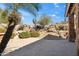 Charming desert landscape and stamped concrete patio provide a serene outdoor space at 11152 E White Feather Ln, Scottsdale, AZ 85262