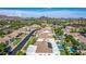 An aerial neighborhood view showcasing desert landscaping with mountains in the distance at 11343 E Appaloosa Pl, Scottsdale, AZ 85259