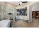 Spa-like bathroom featuring a walk-in shower, soaking tub, dual sinks with accent lighting, and contemporary design at 11343 E Appaloosa Pl, Scottsdale, AZ 85259