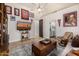 Living room featuring a mounted tv and access to the bathroom at 11343 E Appaloosa Pl, Scottsdale, AZ 85259