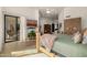 Well-lit main bedroom with a fireplace, a sliding glass door, and a view of the backyard at 11343 E Appaloosa Pl, Scottsdale, AZ 85259