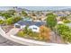 Overhead shot of a well-maintained home with a driveway, yard, and attractive landscaping at 114 E Garfield St, Tempe, AZ 85288