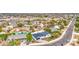 Scenic aerial perspective of a residential area, displaying tidy houses with trees, complemented by neat streets at 114 E Garfield St, Tempe, AZ 85288