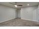 Empty bedroom with neutral carpet and a ceiling fan at 114 E Garfield St, Tempe, AZ 85288