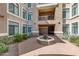 Exterior courtyard featuring desert landscaping and a fountain at 11640 N Tatum Blvd # 2063, Phoenix, AZ 85028