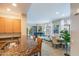 Inviting kitchen area flowing into a living space with an open floor plan and natural light at 11640 N Tatum Blvd # 2063, Phoenix, AZ 85028