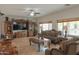 Comfortable living room area with elegant furnishings, and plenty of natural light at 11868 W Kinderman Dr, Avondale, AZ 85323