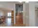 Entryway with staircase featuring tile flooring, and natural wood steps at 11868 W Kinderman Dr, Avondale, AZ 85323