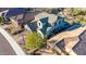 Aerial view of a large two-story home with multiple windows, well-kept landscaping, and an attached garage at 12918 W Caraveo Pl, Peoria, AZ 85383