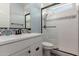 Modern bathroom featuring a glass shower, white cabinetry, and stylish fixtures at 12918 W Caraveo Pl, Peoria, AZ 85383