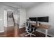 Modern home office with a sleek desk setup and ample natural light at 12918 W Caraveo Pl, Peoria, AZ 85383