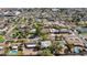 Sprawling aerial view of a community with single-Gathering homes, swimming pools, and verdant landscaping at 1414 E Vermont Ave, Phoenix, AZ 85014