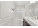 Updated bathroom featuring subway tile, modern vanity, and new fixtures at 1414 E Vermont Ave, Phoenix, AZ 85014