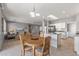 Open floor plan featuring dining area connected to kitchen and living room at 15116 W Carbine Way, Sun City West, AZ 85375