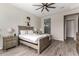 Stylish bedroom featuring an ensuite bathroom with a glass-walled shower and modern fixtures and finishes at 1557 E Flower St, Gilbert, AZ 85298