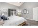 Bright bedroom featuring neutral walls, vinyl flooring, a desk area, and sliding glass door at 15646 E Sunflower Dr, Fountain Hills, AZ 85268