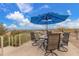 Comfortable outdoor seating area with umbrella offers scenic views and a relaxing space at 15646 E Sunflower Dr, Fountain Hills, AZ 85268