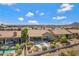 A vibrant community with well-maintained backyards, desert landscaping, and mountain views in the background at 16102 E Glenview Dr, Fountain Hills, AZ 85268