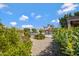 Backyard featuring well-manicured landscaping, an inviting outdoor seating area, and desert views at 16102 E Glenview Dr, Fountain Hills, AZ 85268