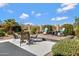 Outdoor seating area featuring comfortable seating, manicured landscaping and desert views beyond at 16102 E Glenview Dr, Fountain Hills, AZ 85268