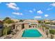 Relax at the community pool with sun loungers, dining areas, and lush landscaping, offering a resort-style feel at 16102 E Glenview Dr, Fountain Hills, AZ 85268