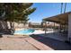 Inviting backyard pool with mature landscaping and covered patio at 16409 S 46Th St, Phoenix, AZ 85048