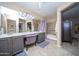 Well-lit bathroom features double sinks, vanity area, and a separate shower/tub at 16409 S 46Th St, Phoenix, AZ 85048