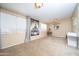 Relaxing living space with an Eiffel Tower art piece and natural light from the windows at 16409 S 46Th St, Phoenix, AZ 85048