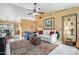 Inviting living room with high ceilings, tile flooring, and bright, neutral-colored walls at 1647 E Christina St, Casa Grande, AZ 85122