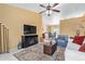 Inviting living room with tile flooring, and bright, neutral-colored walls at 1647 E Christina St, Casa Grande, AZ 85122