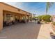 Wide backyard patio perfect for entertaining guests by the pool at 17470 W Gelding Dr, Surprise, AZ 85388