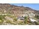 Elevated aerial view of a desert home positioned on a hillside with breathtaking mountain scenery at 1844 E Cinnabar Ave, Phoenix, AZ 85020