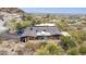 Aerial view showcasing the backyard, hillside neighborhood, city views, and landscaping at 1844 E Cinnabar Ave, Phoenix, AZ 85020