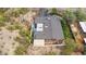 Overhead aerial view showing the home's layout, patio, and desert landscaping at 1844 E Cinnabar Ave, Phoenix, AZ 85020