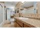 Cozy bathroom offering a large vanity, lots of mirror space, and tub shower at 1844 E Cinnabar Ave, Phoenix, AZ 85020