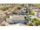 Gorgeous aerial view showcasing backyard, landscaping, pool, and outdoor living spaces at 18468 N 63Rd Dr, Glendale, AZ 85308