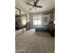 Bedroom features dark trim, neutral toned walls and carpet, and a mirrored closet in this cozy space at 18468 N 63Rd Dr, Glendale, AZ 85308