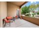 Covered patio with comfortable seating, offering a serene outdoor living space at 18944 E Amethyst Dr, Rio Verde, AZ 85263