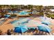 Aerial view of resort-style pools with cabanas and lounge areas at 19975 W Glenrosa Ave, Litchfield Park, AZ 85340