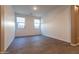 Bedroom with neutral-colored floors and large windows at 19975 W Glenrosa Ave, Litchfield Park, AZ 85340