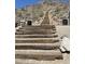 Hiking trail with wooden steps leading up the hillside at 19975 W Glenrosa Ave, Litchfield Park, AZ 85340