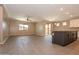 Bright, open-concept kitchen featuring a large island, stainless steel appliances, and tile flooring at 19975 W Glenrosa Ave, Litchfield Park, AZ 85340