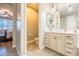 Elegant bathroom features double sinks, pendant lights, and a separate toilet room at 20138 E Estrella Rd, Queen Creek, AZ 85142