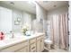 Charming bathroom with double sinks and neutral-toned tile flooring at 20138 E Estrella Rd, Queen Creek, AZ 85142