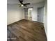 Main bedroom with en suite bathroom featuring a sliding barn door at 2034 E Charleston Ave, Phoenix, AZ 85022