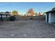 Large, spacious backyard with a block wall along the back at 2045 W Colter St, Phoenix, AZ 85015