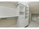 Walk-in closet with shelves and drawers for optimal storage and organization solutions at 2170 E Caroline Ln, Tempe, AZ 85284