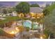 Aerial view of the private pool, hot tub, fire pit, and outdoor living space in the backyard at 2170 E Caroline Ln, Tempe, AZ 85284