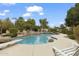 Inviting backyard pool surrounded by lush landscaping at 2170 E Caroline Ln, Tempe, AZ 85284